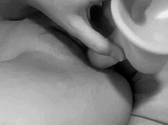 masturbating with a thick dildo for pleasure