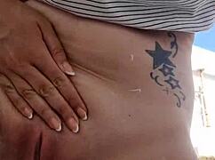 A woman shaves her intimate area