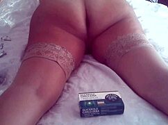 Milf's ass takes glycerin and vibrator close up