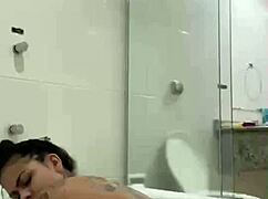 bia masturbates with shower jet