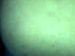 In a retro blue film, she rides his cock with her ass on display