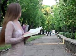 Arina G from Metart slowly undresses, revealing her natural tits