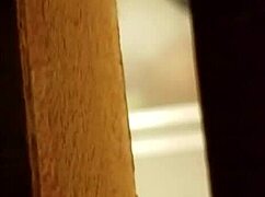 I spied on the prostitute shaving her hairy pussy in the hidden spot.