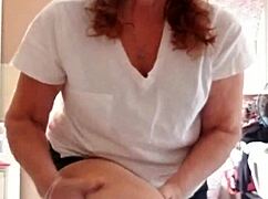 she applies lotion to her smooth skin