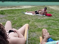 Voyeur jerking off on the beach while I touch myself in public