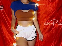 amateur girl performs a solo striptease and poses naked in homemade video.