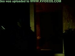 this doll is bound in latex with a condom and mask under control