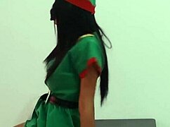 I’m celebratin’ Christmas in my suit, takin’ off clothes bit by bit while dancin’ sexy on the desk