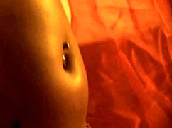 The Indian brunette milf sensing her own sexiness while undressing.