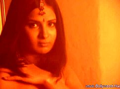 The Indian brunette milf sensing her own sexiness while undressing.