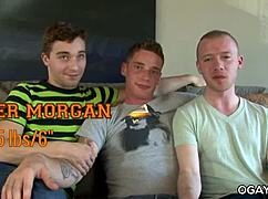 Gay Threesome Sucks Huge Cock on Couch