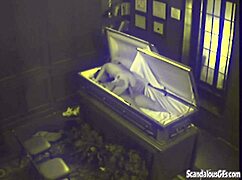 Watch This Couple Get Caught Fucking Hardcore In A Coffin!