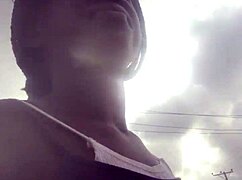 Crazy chick hunting a supermarket for a lighter to smoke.