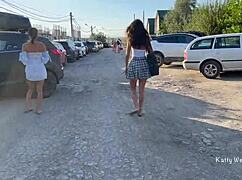 Two young girls stroll through the park without underwear, exposing themselves to onlookers