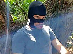 Two motorcyclists behind a factory in the bushes