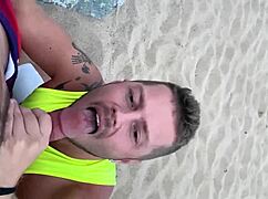 Hey, wanna see a hot gay blowjob on the beach?