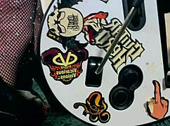 rocker caresses pussy with vibrator and plug