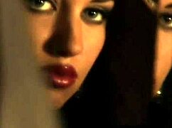 Lovely brunette dances gracefully in the spotlight