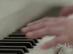 Piano tutor seduces with big boobs.