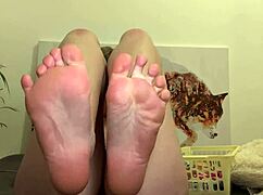 Girl In Red Outfit Shows Body And Feet