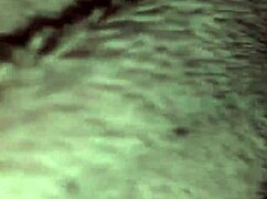 She is MASTURBATING in her private moment.