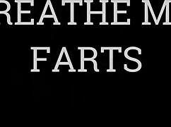 Mistress farts on slave's face during intense ass worship.