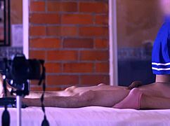 Young student gently caresses his stepmother's body on the sofa.