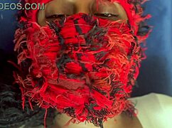 Ebony squirts through shorts