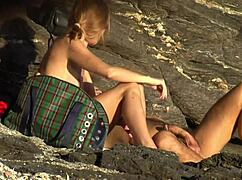 Mature couple gets wild on the beach sand