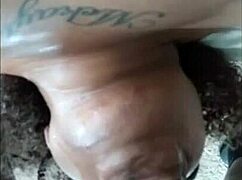 She's giving a sloppy blowjob upside down, her fat ebony ass bouncing.