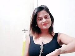indian babe with big tits and ass dances naughtily while sucking, fucking, and teasing her pussy