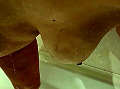 brunette masseuse rubs wet pussy on client during nuru massage