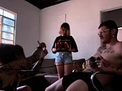 Behind the scenes, naked woman sucks Carmona while playing video game