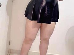 This Latina milf secretary strips and shows off her panties and more.