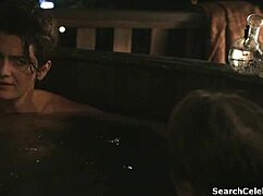 Feeling the passion as Gaby Hoffmann and Cherry Jones get intimate in transparent outfits.