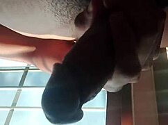 I caught this hot guy with a big dick jerking off in public by the window