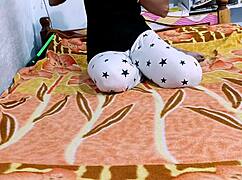 Watch this indian hot wife give handjob, blowjob, and footjob to her husband.