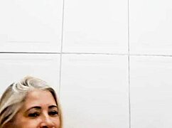 in the bathroom, shoving a dildo deep into my pussy.