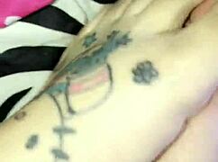 pretty tattooed feet get worshipped in this fetish video