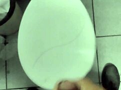 A young professional takes a break at work to relax quietly, focusing on personal tasks without distractions.