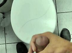 A young professional takes a break at work to relax quietly, focusing on personal tasks without distractions.