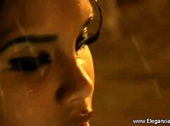 BRUNETTE ORIENTAL COUGAR TEASES WITH STRIPTEASE!