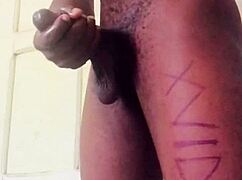 This homemade video shows a big black cock jerking off