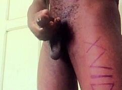 This homemade video shows a big black cock jerking off