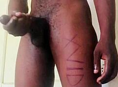 This homemade video shows a big black cock jerking off