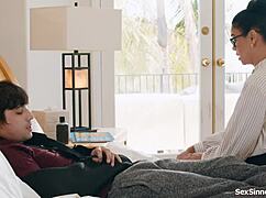 Teacher offers student a helping hand in the classroom