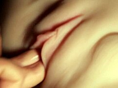 practicing fingering techniques with a real doll close up