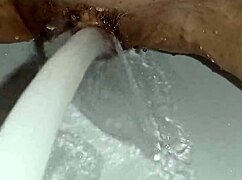 Amateur Gretala Applies Soap To Her Trimmed Pussy In Video