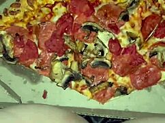 OMG, this food porn with a Saudi babe stuffing pizza in wild places is insane! 😲