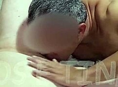 Husband and wife sharing an intimate moment in bed